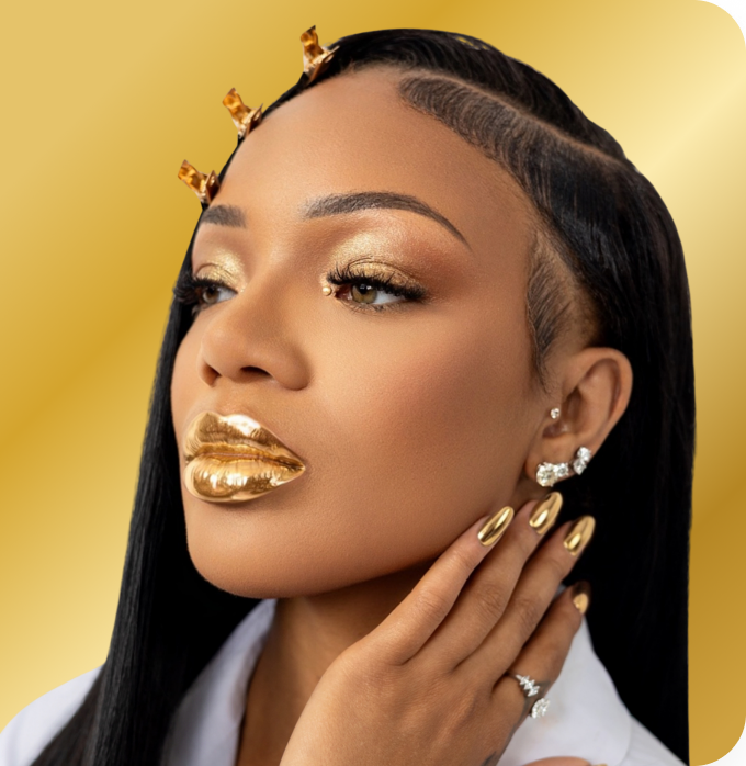 GloRilla wearing gold makeup and jewelry
