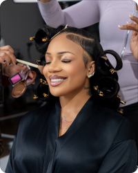 GloRilla getting her hair styled